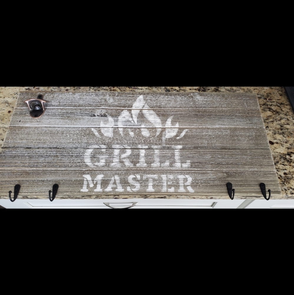 Bbq sign with utensil  holders and a bottle opener. Grey, black and  brown